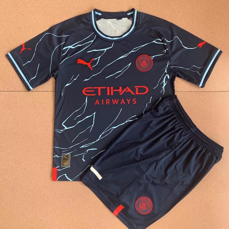 23/24 Manchester City Kids Kit with Socks Special Edition